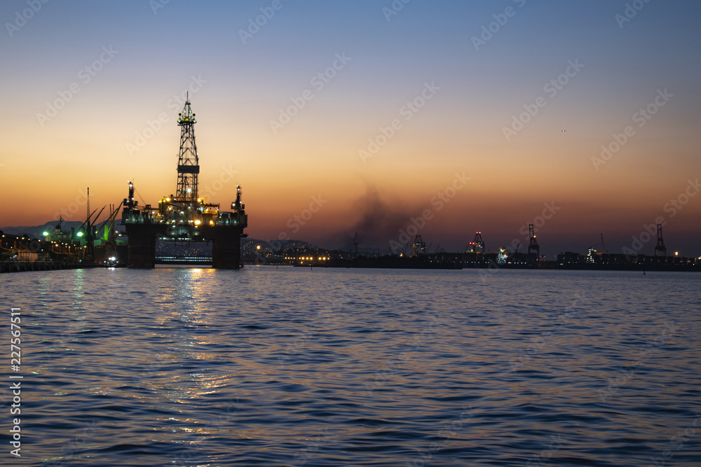 oil platform at sunset