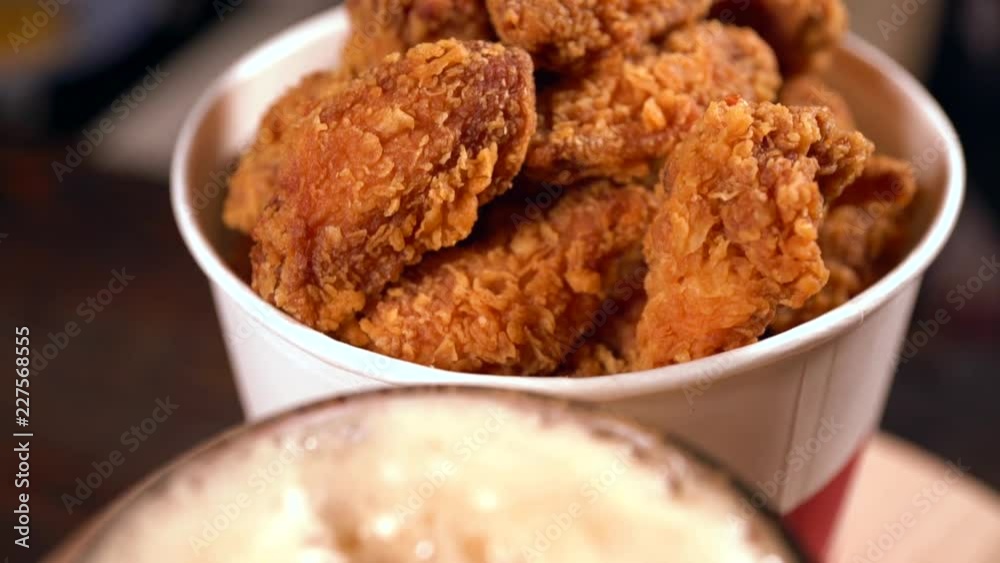 Punnet of fried crumbed chicken wings Punnet of fried crumbed chicken wings