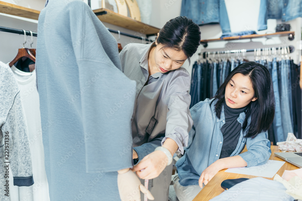 Fashion designer working in studio Fashion designer working in studio
