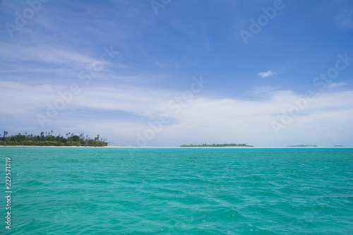 Blue ocean  blue sky  white shore  vacation in tropical island  There are 4 islands in Kayangel state  Palau  Pacific