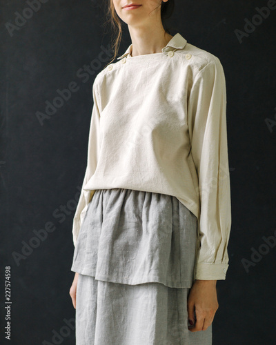 Crop woman in blouse and skirt