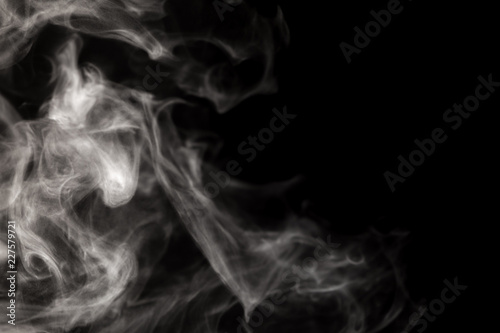 Abstract white smoke vertical line on black background