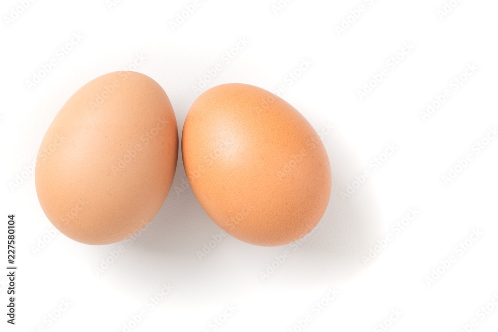 Couple brown chicken egg on white background Couple brown chicken egg on white background
