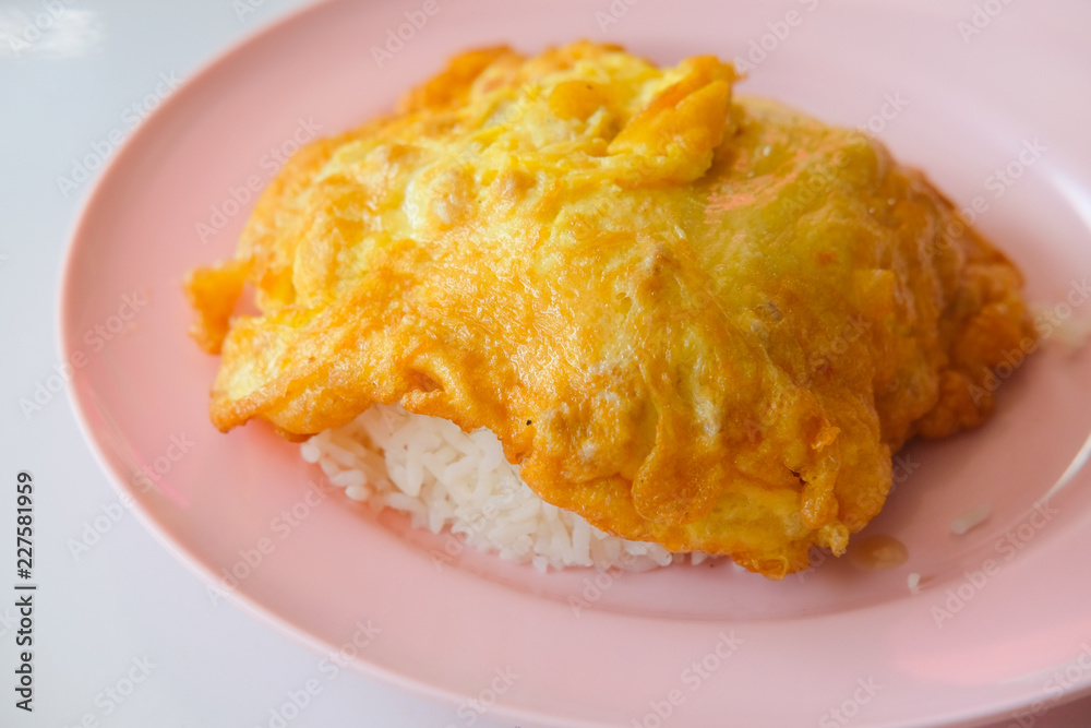 Thai style pork omelette on hot steamed rice Thai style pork omelette on hot steamed rice