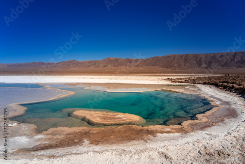 lagunas de baltinache - lake surrounded by salt in the middle of the atacama desert