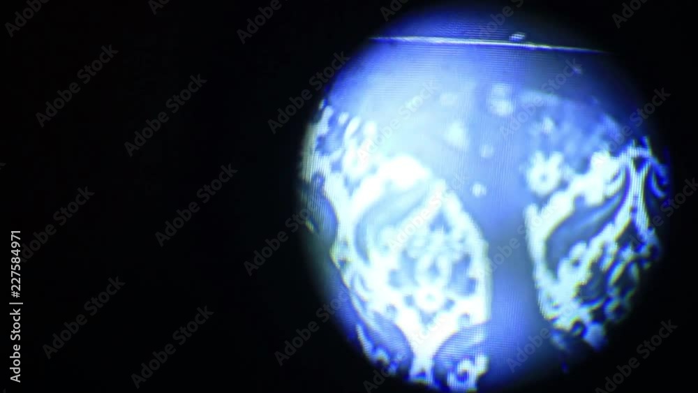 Inverted view inside the projector's optics.