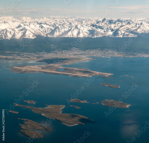 Aerial view over Beagle Channel, airport, city and mountains of Ushuaia, Argentina