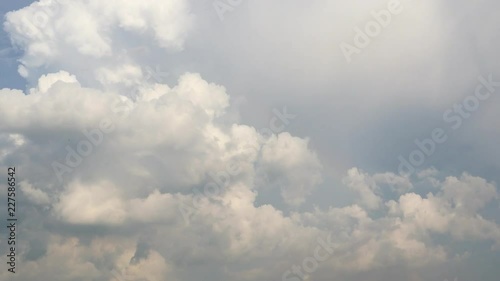 Dramatic atmosphere panorama 4K Time-lapse footage  clip of blue sky and storm clouds on tropical season.