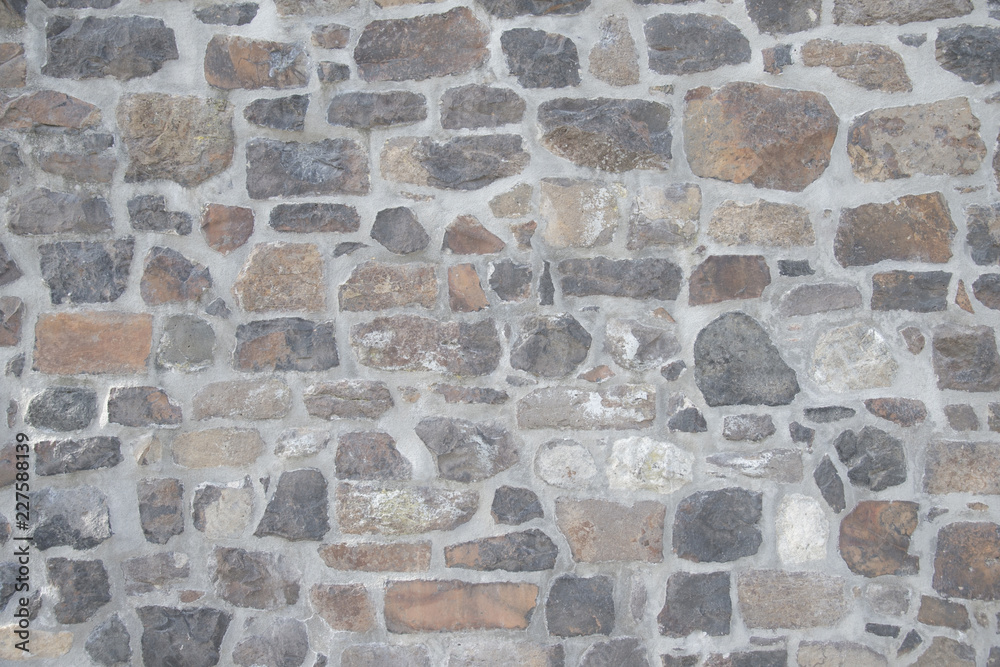 Polygone Mauer aus Natursteinen Hintergrund Polygone Mauer aus Natursteinen Hintergrund
