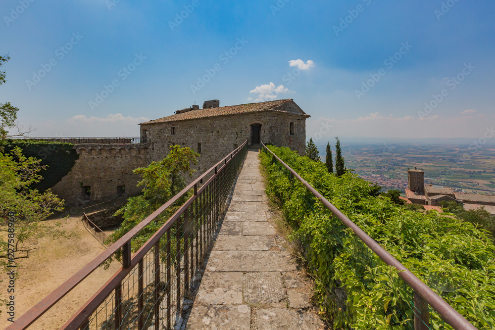 Patrol path on top of the walls of Fortress Girifalco, in Cortona, Italy Patrol path on top of the walls of Fortress Girifalco, in Cortona, Italy