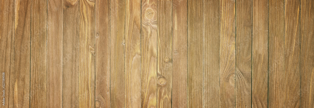 Naklejka premium Panoramic view of a wooden table, wood texture close-up