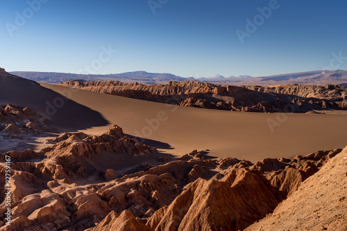 atacama desert, valle de marte, sand and sun landscape that look like mars photo