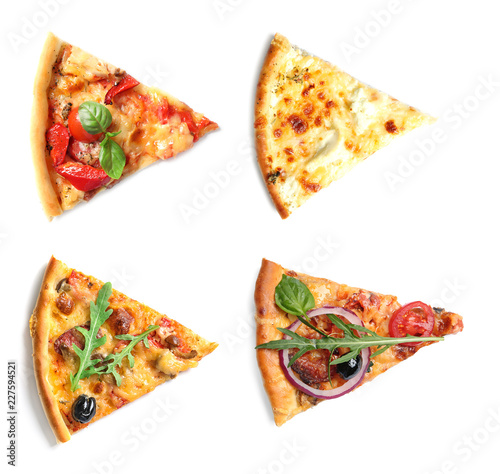 Set with different pizza slices on white background, top view
