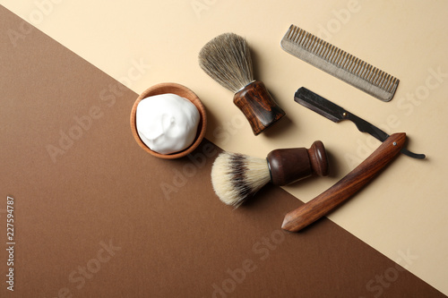 Fototapeta Naklejka Na Ścianę i Meble -  Flat lay composition with shaving accessories for men on color background