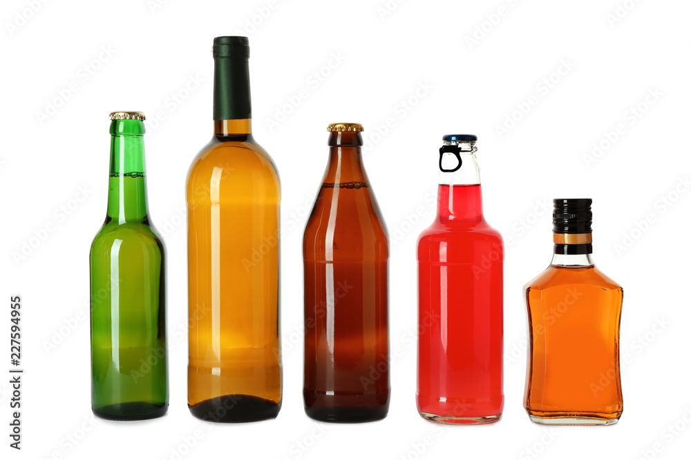 Bottles with different alcoholic drinks on white background Bottles with different alcoholic drinks on white background