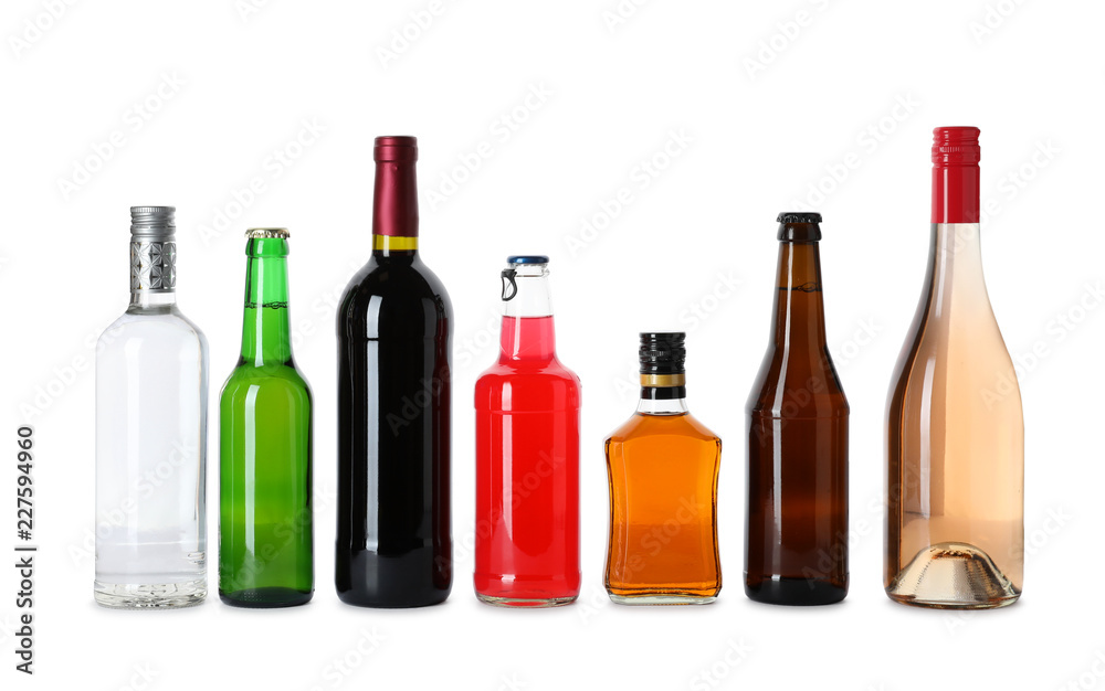 Bottles with different alcoholic drinks on white background Bottles with different alcoholic drinks on white background