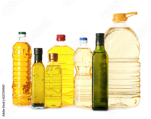 Fototapeta Naklejka Na Ścianę i Meble -  Bottles with different oils on white background