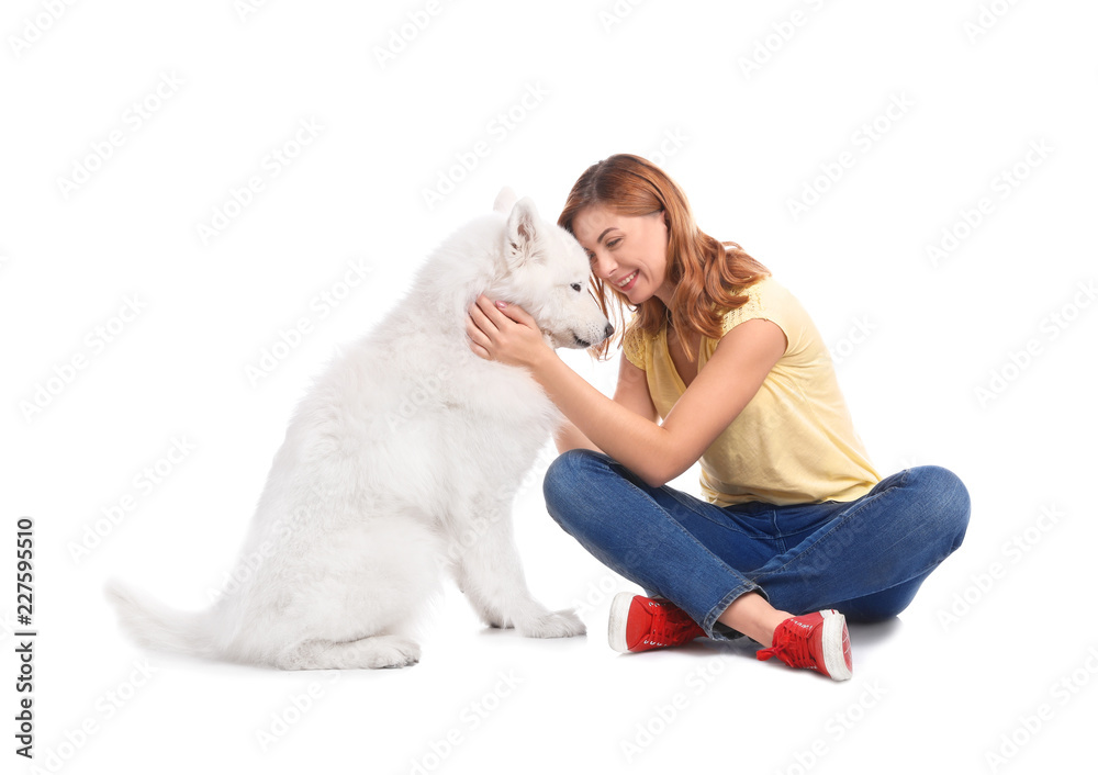Beautiful woman with her cute dog on white background Beautiful woman with her cute dog on white background