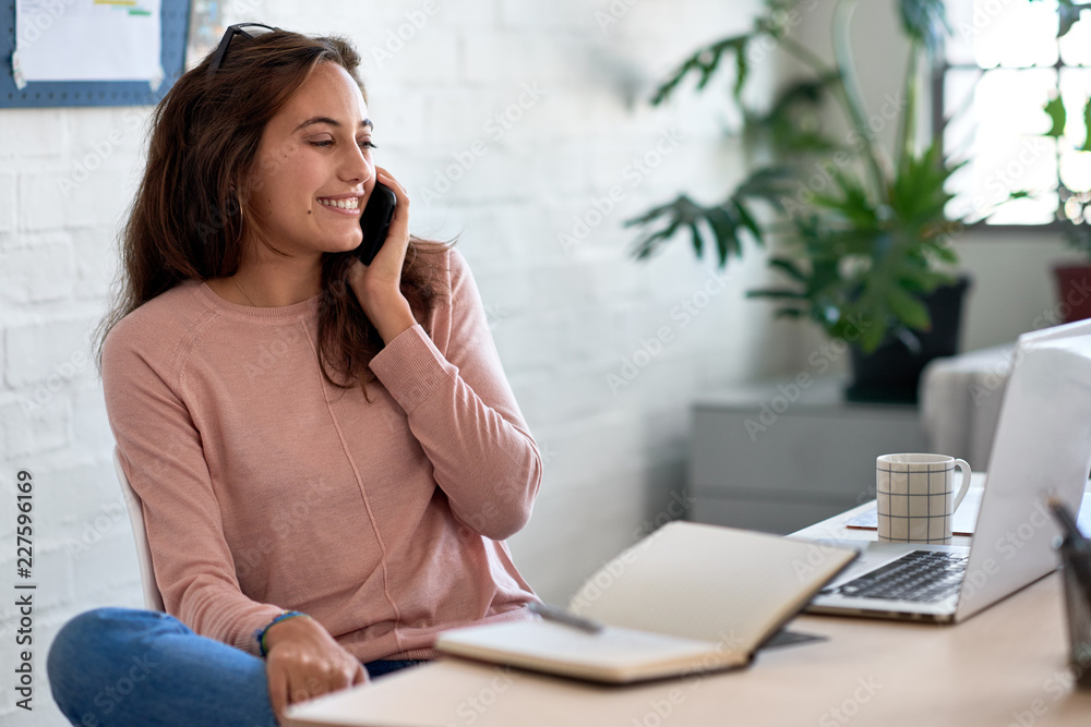 Casual confident businesswoman on phonecall Casual confident businesswoman on phonecall