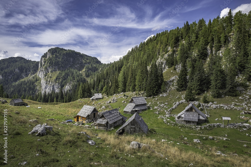 Traditional shepherd huts on high mountain pasture Visevnik in Julian Alps, Slovenia