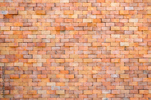 Colorful patterned brick wall for background.