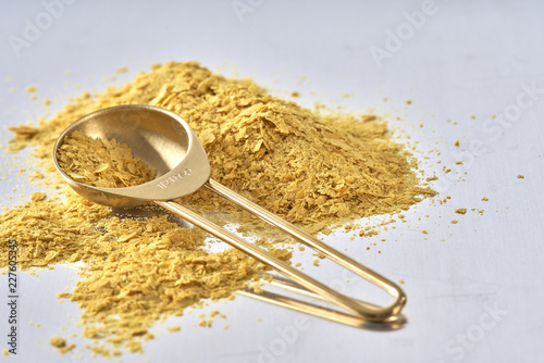 Nutrional Yeast, Used in Vegan and Dairy-Free Cooking as a replacement for cheese/dairy flavor.