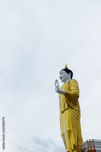 The erected buddha statue under clear sky in Chiangmai,Thailand.