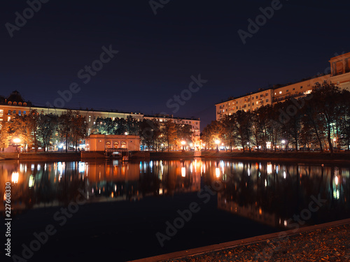 Patriarshiye ponds at night city background photo
