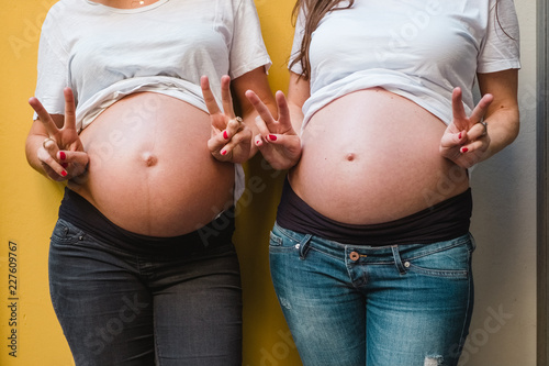 Two bellies of future mother