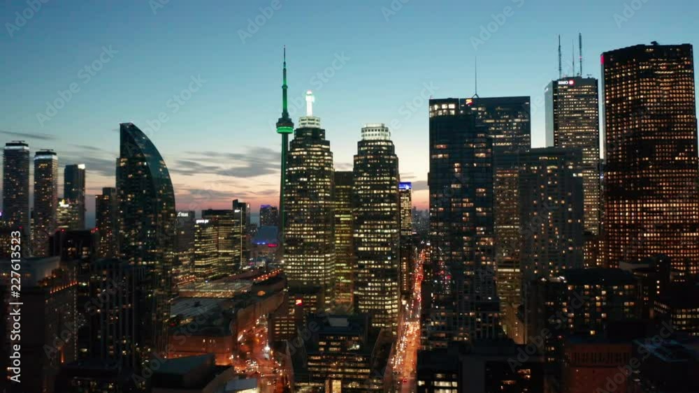 dusk flying right view of Toronto skyline