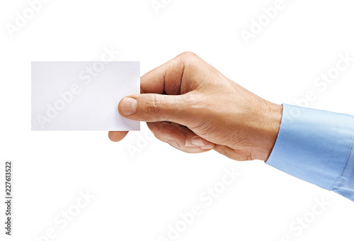 Man's hand in shirt holding empty business card isolated on white background. Close up. High resolution product