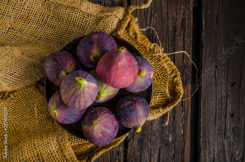 Fresh figs on wood board