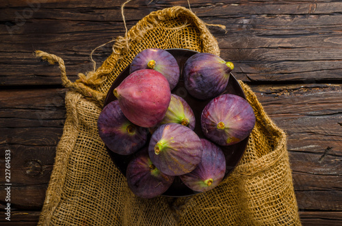 Fresh figs on wood board