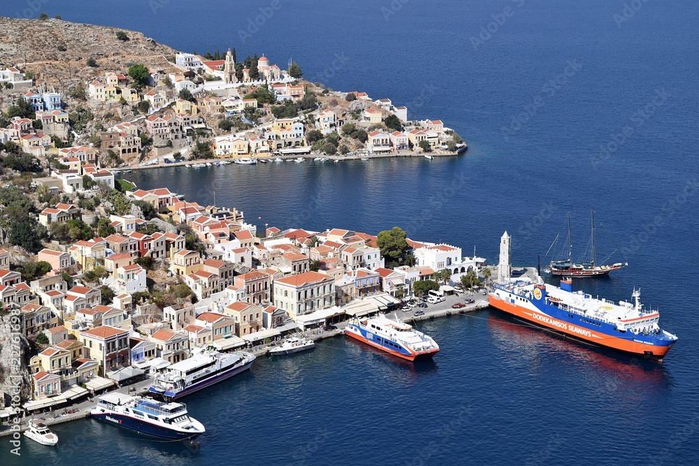 Beautiful mountain landscape. Sea city. Mountain village. Greek island. Greece.Simi Island. Beautiful mountain landscape. Sea city. Mountain village. Greek island. Greece.Simi Island.