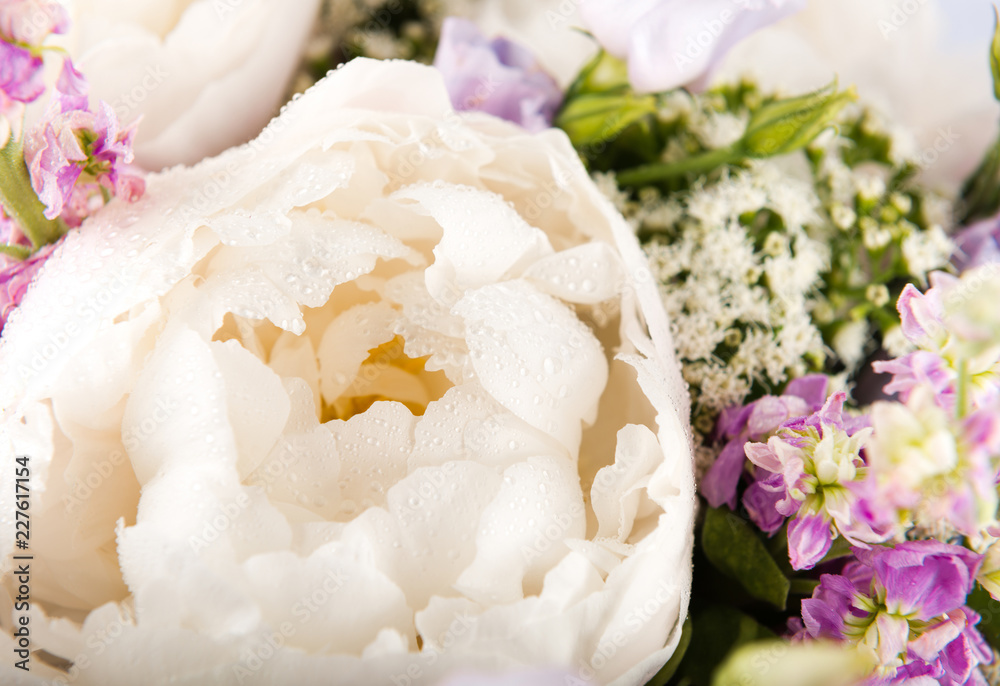 white peony in a floral bouquet white peony in a floral bouquet