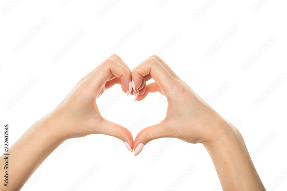 Female hands in the form of heart Female hands in the form of heart