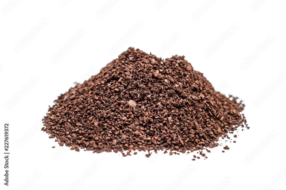 Heap of ground coffee on white. Heap of ground coffee on white.