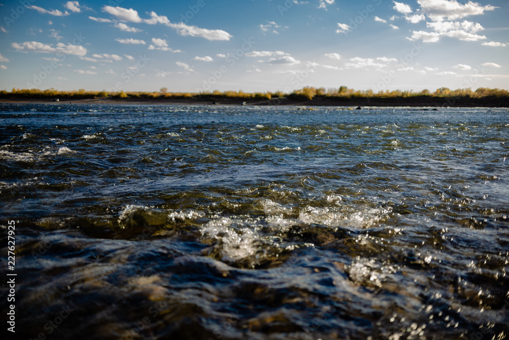 Quiet river water in the evening light background Quiet river water in the evening light background
