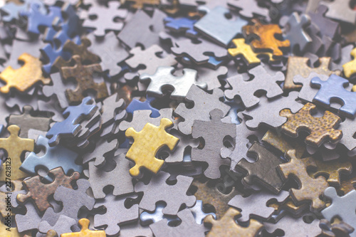 Selective focus of pieces puzzle jigsaw, puzzle background. Jigsaw puzzle color background.