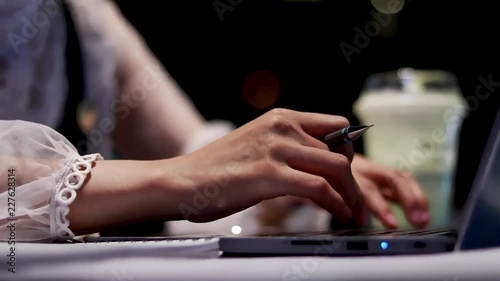 Women are working on computers in the middle of the night.