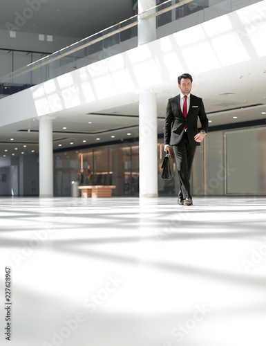 businessman out of the office building