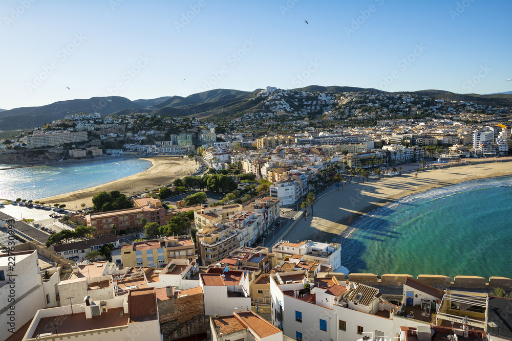 Aerial view of Peninsula town with harbour and marina , Costa del Azahar, province of Castellon, Valencian Community. Peniscola is a popular tourist destination in Spain. View from the castle. 