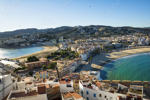 Aerial view of Peninsula town with harbour and marina , Costa del Azahar, province of Castellon, Valencian Community. Peniscola is a popular tourist destination in Spain. View from the castle.  © elephotos