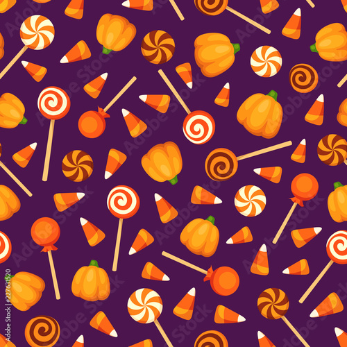 Vector seamless pattern with Halloween candies on a purple background. 