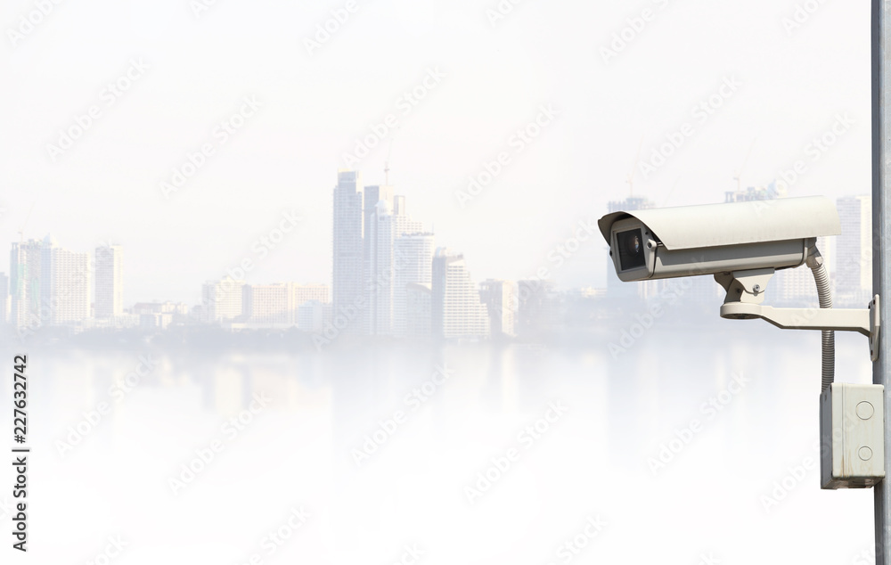 CCTV camera with city background