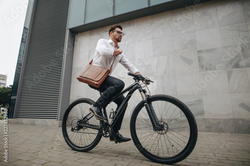 Businessman riding a bicycle