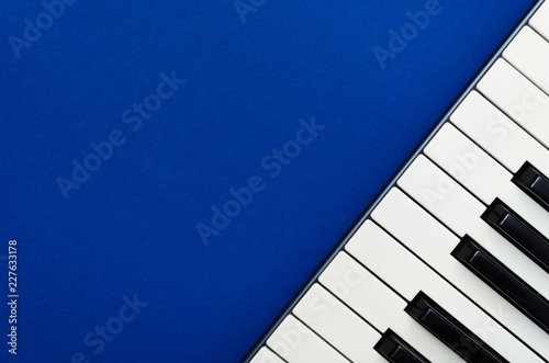 Photography Abstract blue background with a keyboard in the right corner