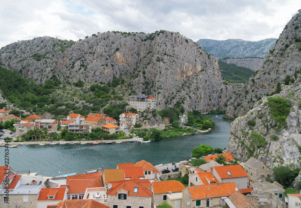 Beautiful summer view on Omis town and Cetina river in Croatia.