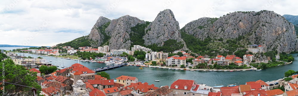 Panoramic view on Omis town and Cetina river in Croatia.