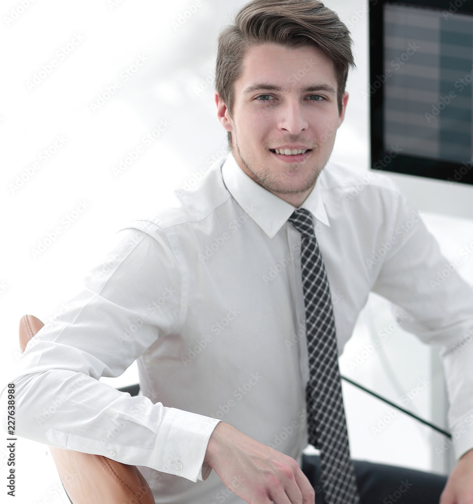 employee sitting in front of a computer screen employee sitting in front of a computer screen